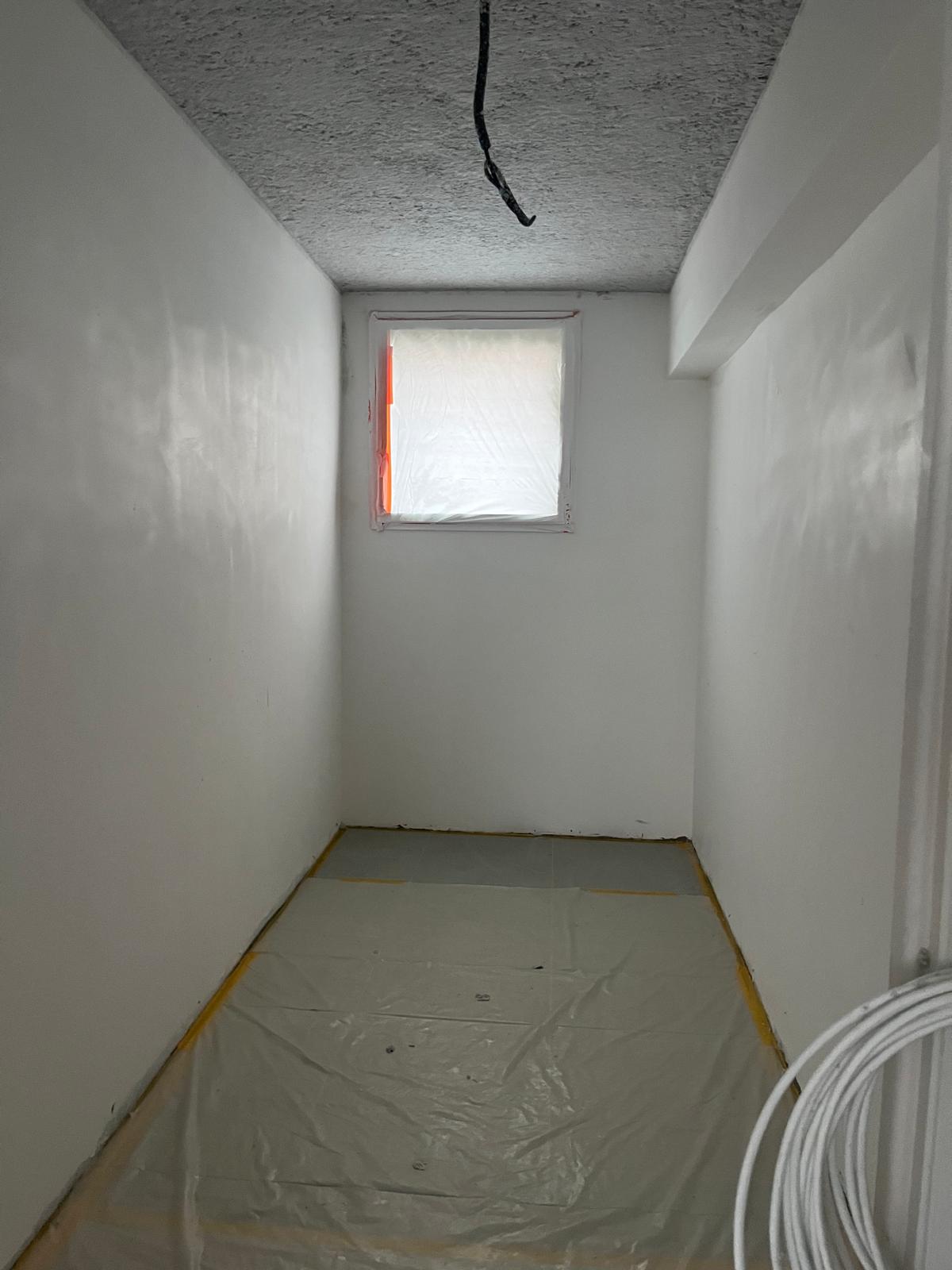 Isolation thermique de plafond par projection