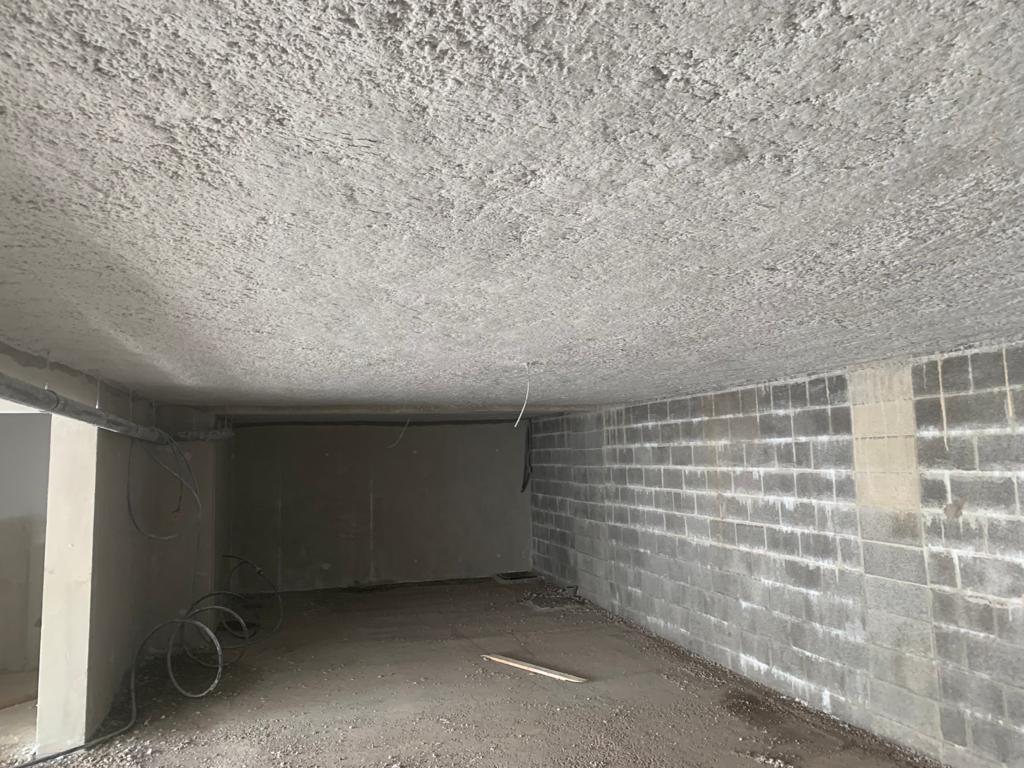 Flocage coupe-feu plafond sous-sol