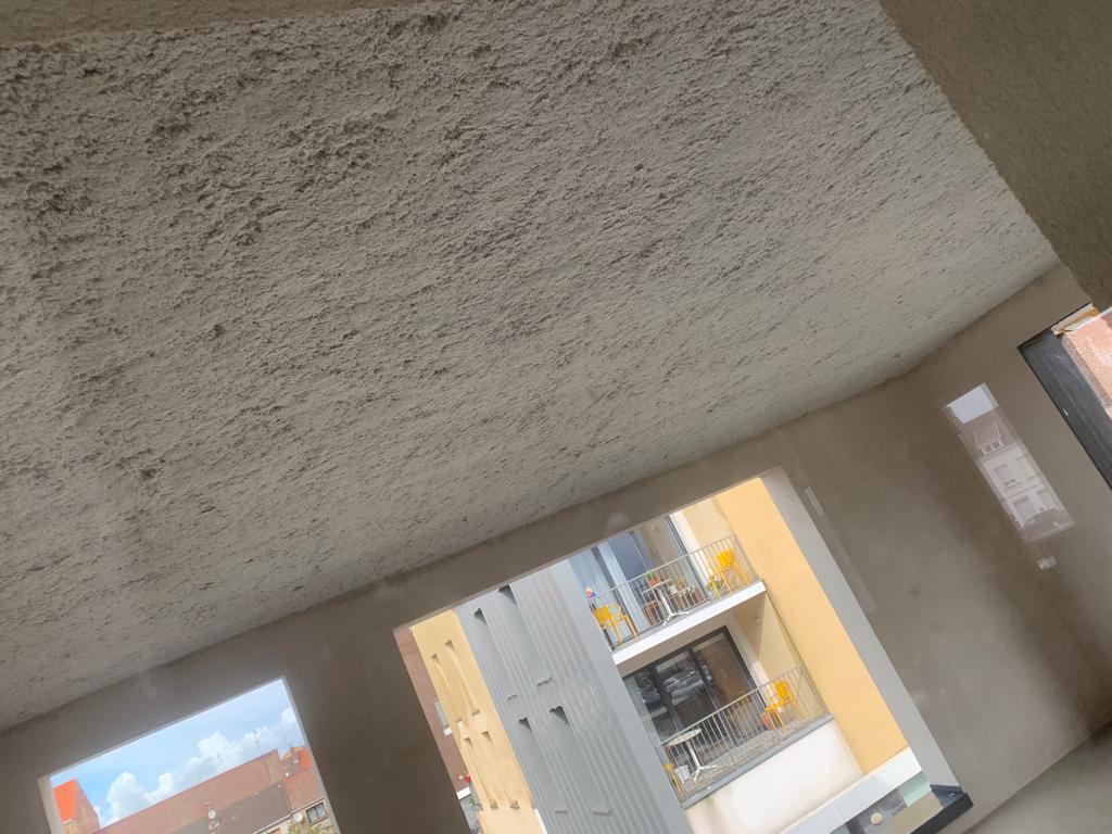 Flocage coupe-feu plafond immeuble résidentiel
